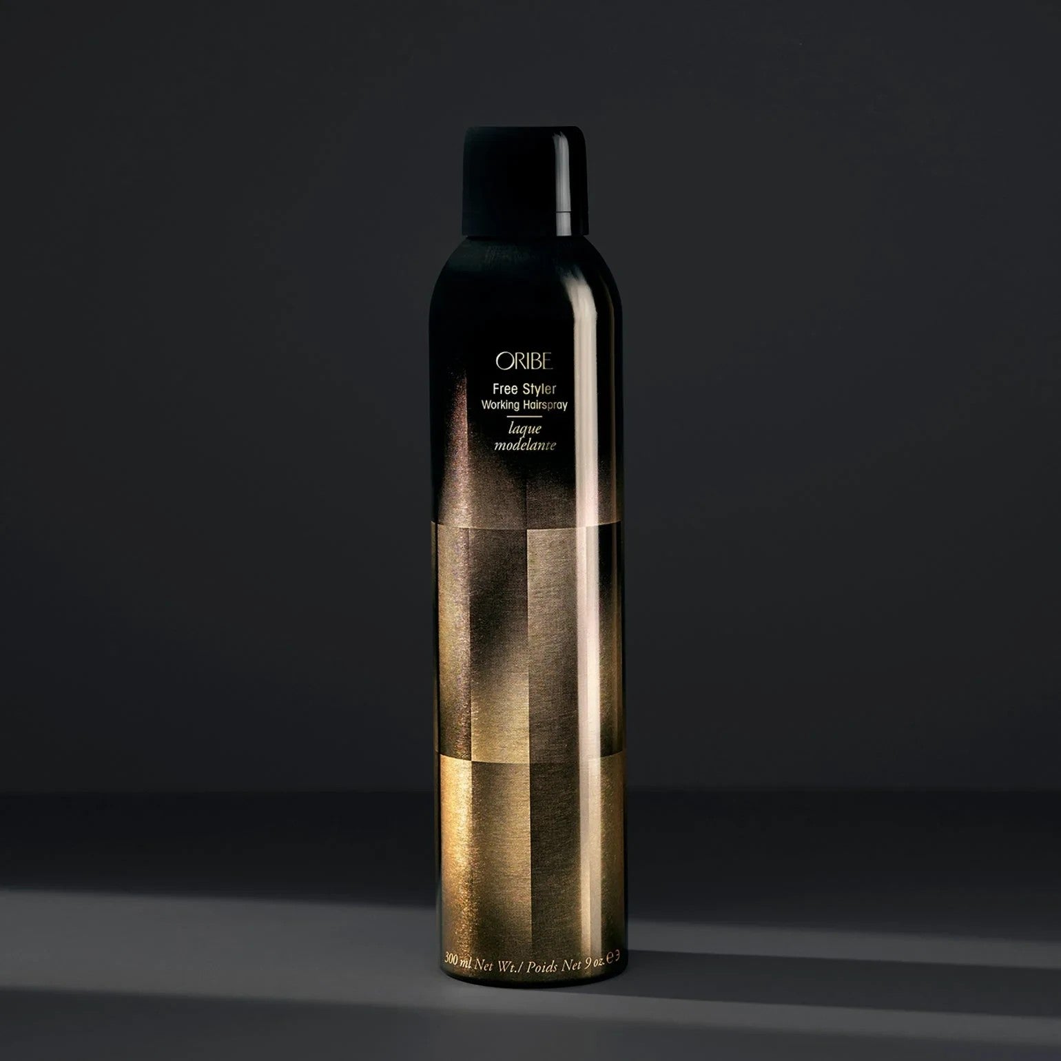 Shop Rescue Spa ORIBE Free Styler Working Hairspray with a satin finish and light, brushable hold.