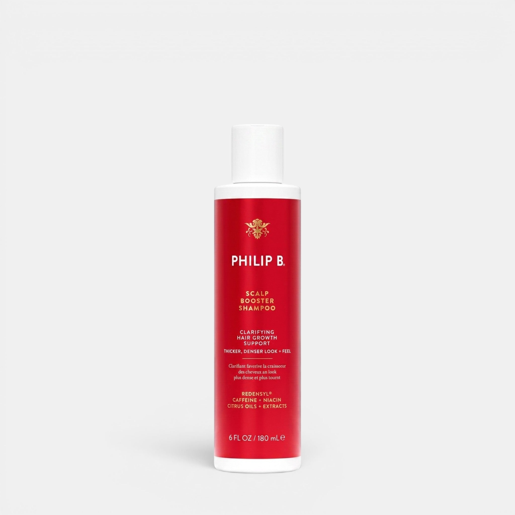 Shop Rescue Spa Philip B. Scalp Booster Shampoo in a red bottle for hair growth support and scalp clarification.