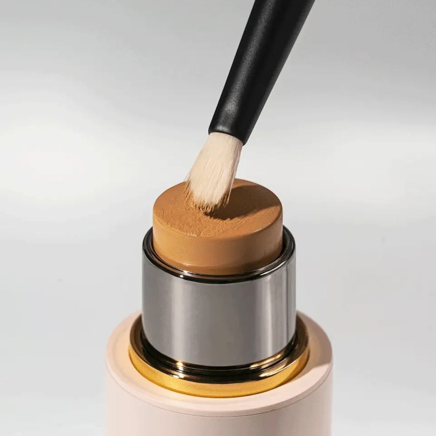 Shop Rescue Spa Spot Check Brush with soft nylon bristles applying foundation from a stick for targeted coverage.