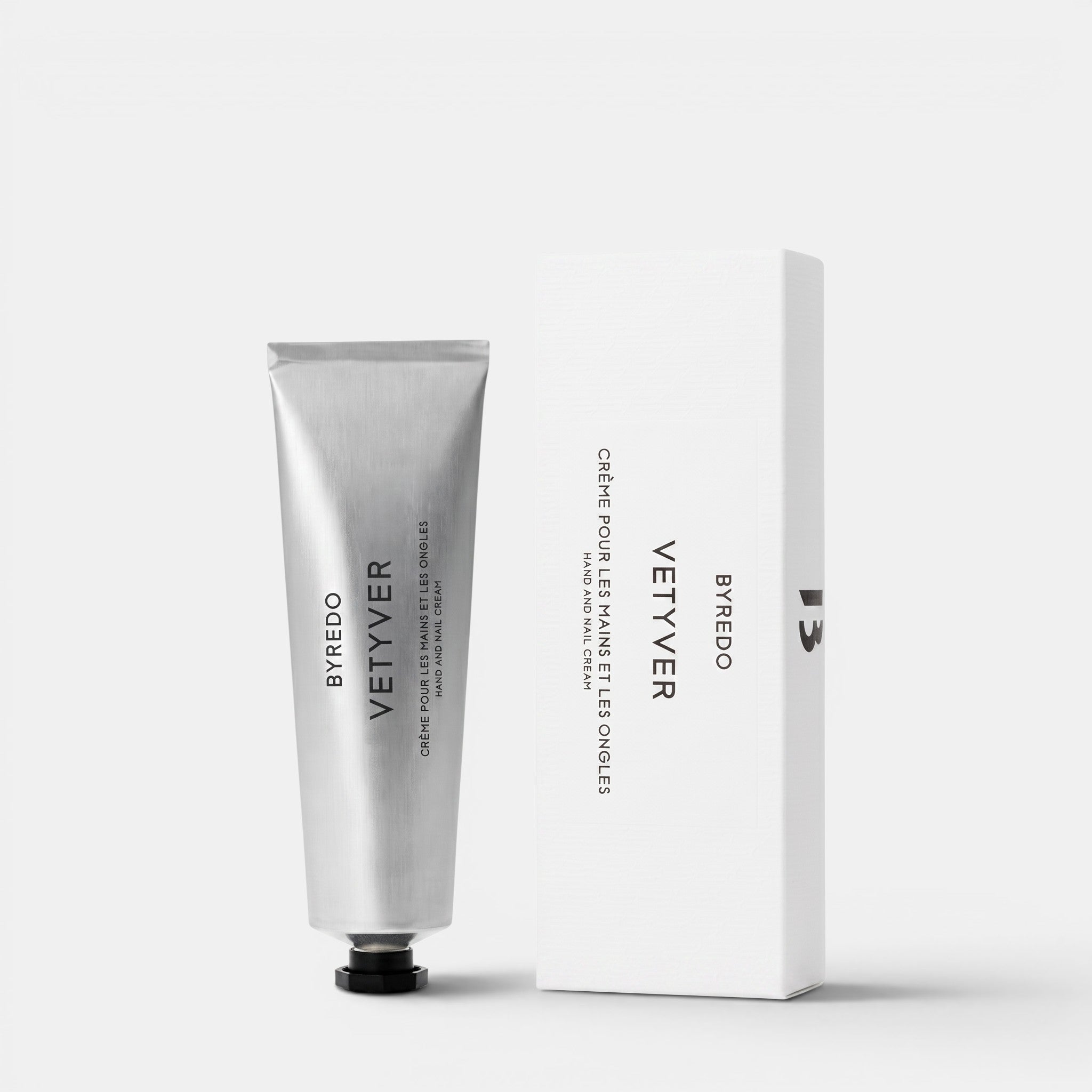Shop Rescue Spa Byredo Vetyver hand and nail cream tube and white box packaging on a clean white background.