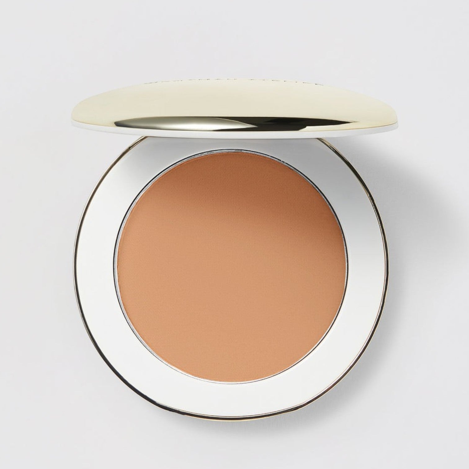 Shop Rescue Spa Vital Pressed Skincare powder in a tan shade, featuring a sleek compact with a gold lid.