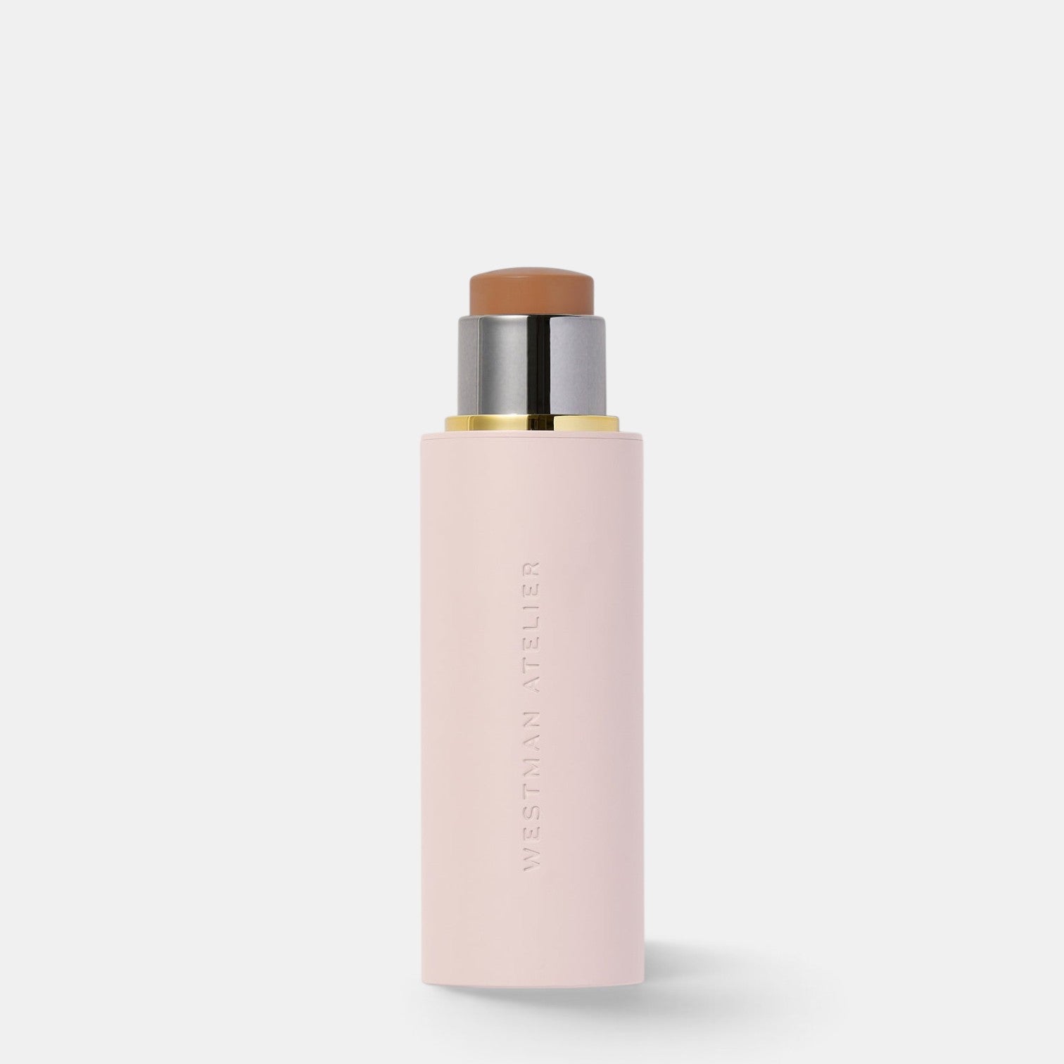 Shop Rescue Spa Vital Skin Foundation Stick in a pale pink twist-up tube with a metallic gold and silver base.