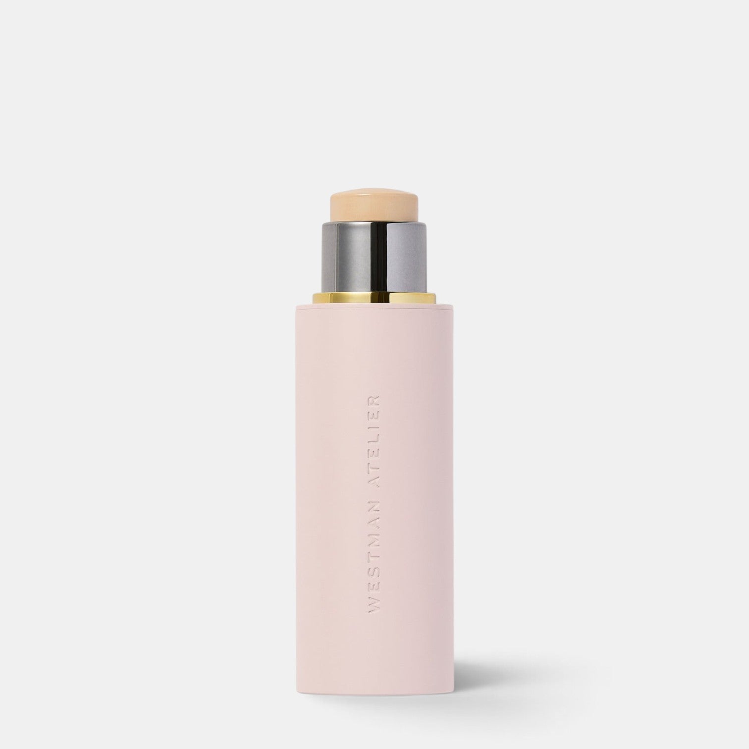 Shop Rescue Spa Westman Atelier Vital Skin Foundation Stick in a pale pink cylindrical tube with metallic accents.