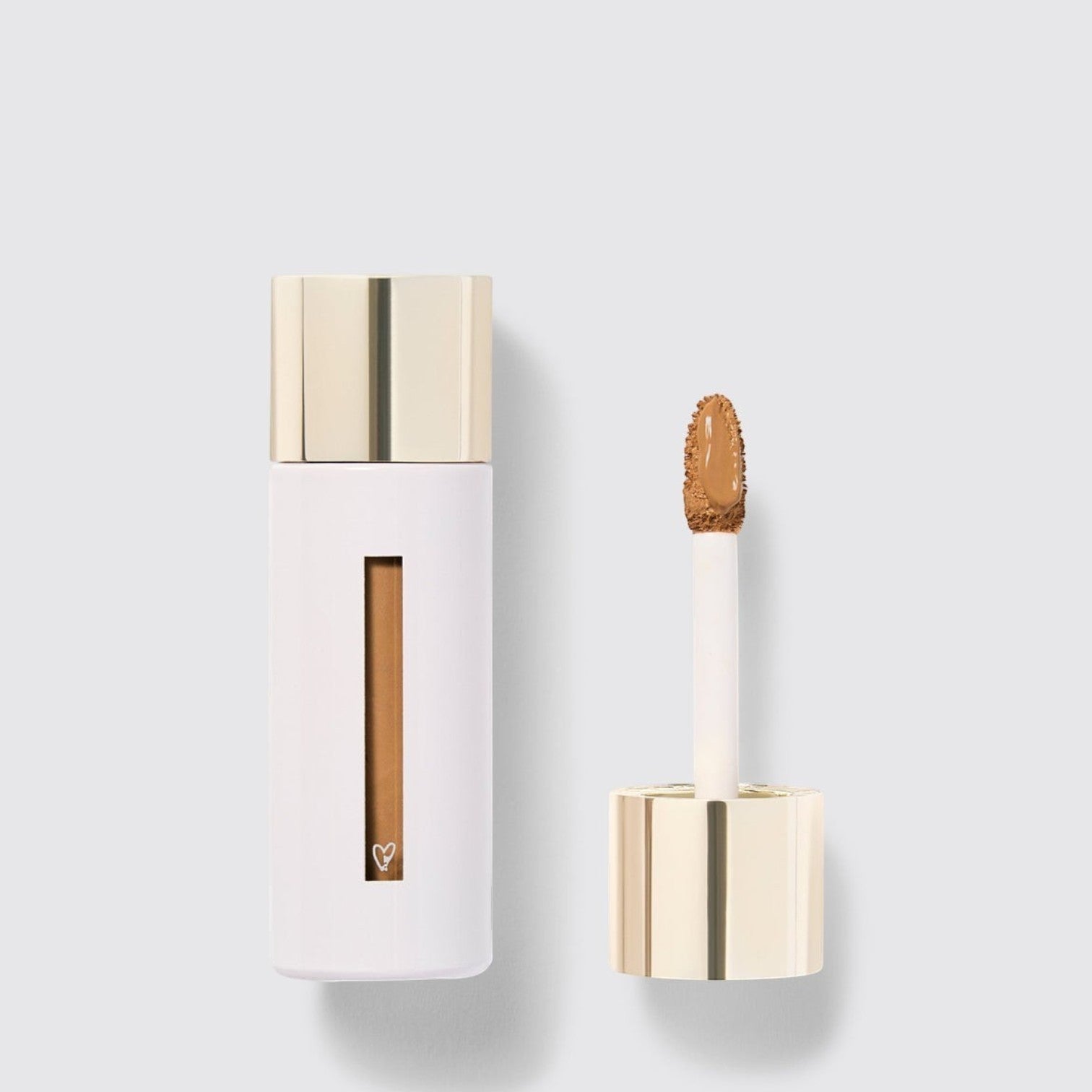 Shop Rescue Spa Westman Atelier Vital Skincare Concealer with doe-foot applicator and gold cap on white background