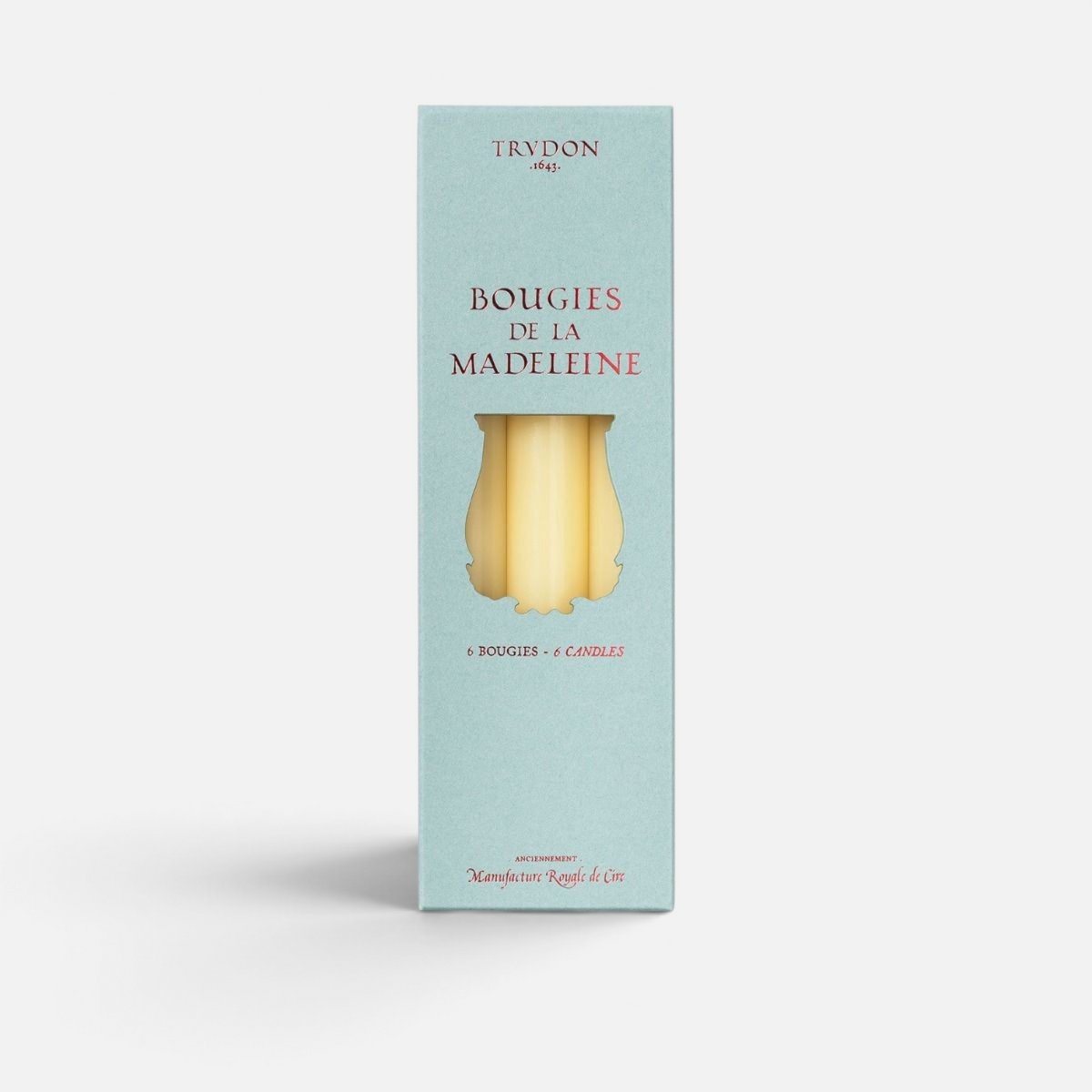 Shop Rescue Spa Trudon Madeleine taper candles in a light blue box with six cream-colored wax candles visible.