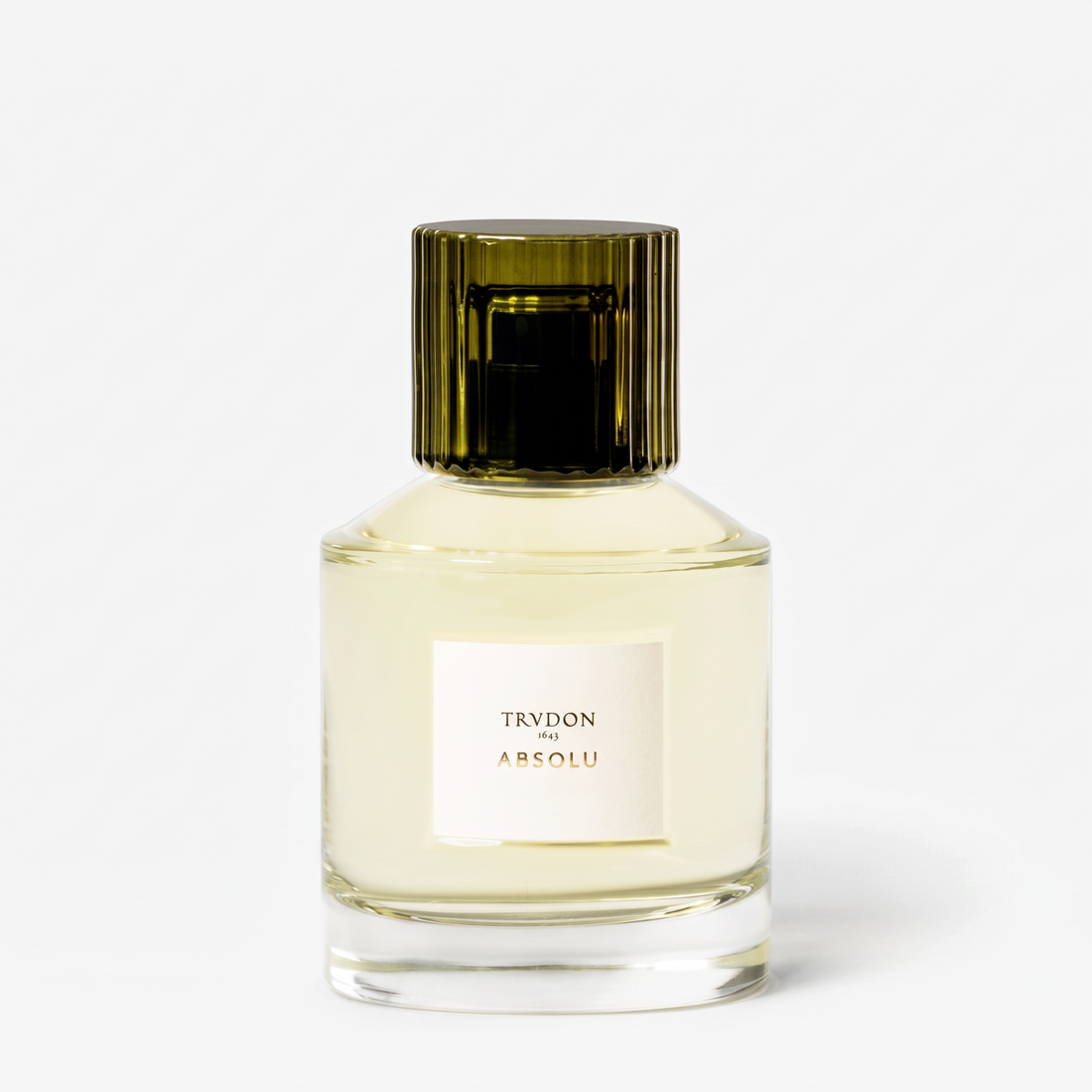 Shop Rescue Spa Trudon Absolu Eau de Parfum in a clear glass bottle with a dark green ribbed cap