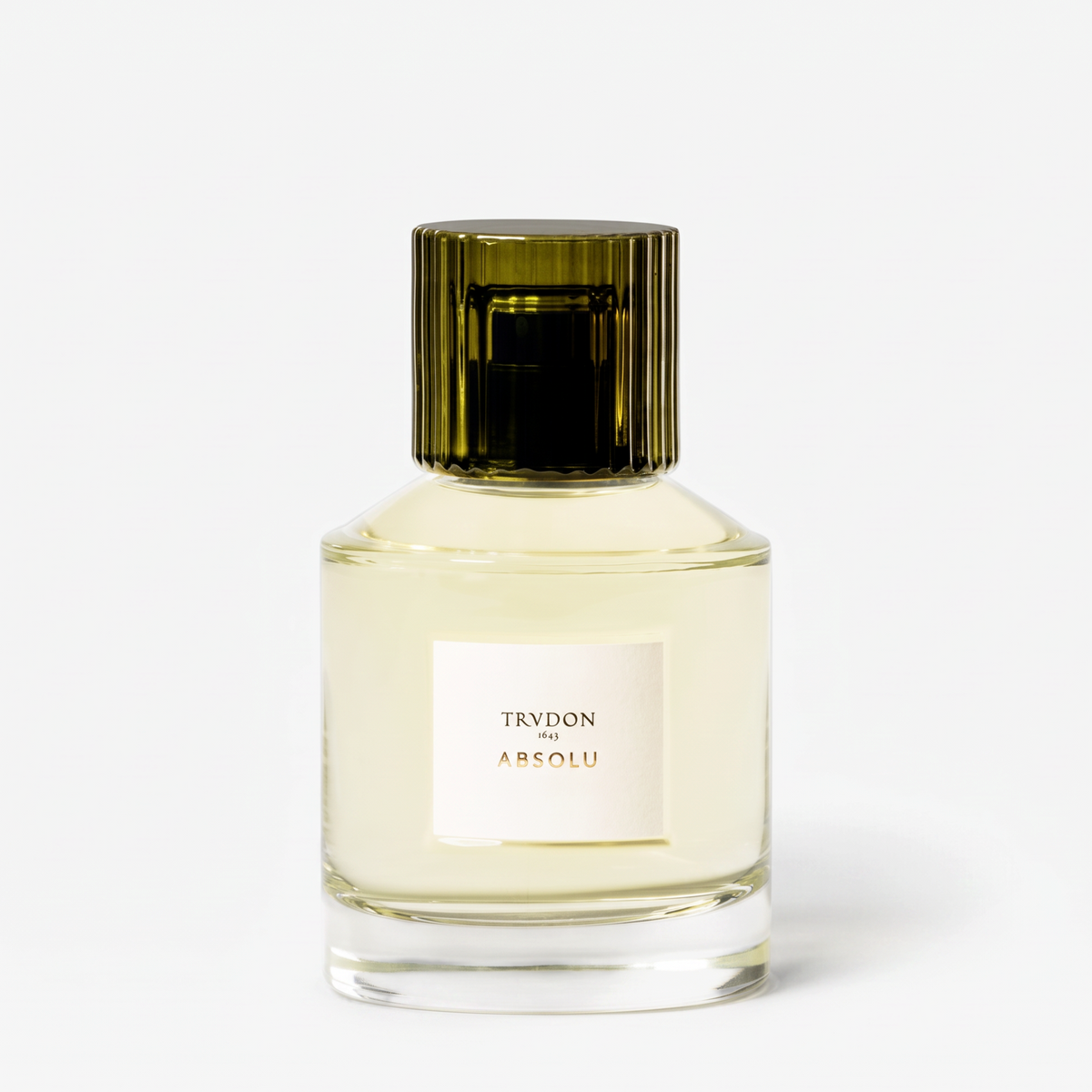 Shop Rescue Spa Trudon Absolu Eau de Parfum in a clear glass bottle with a dark green ribbed cap