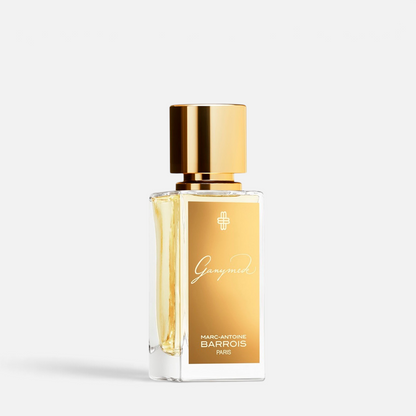Shop Rescue Spa Ganymede Eau de Parfum in a clear glass bottle with a gold label and cap, elegant niche fragrance.
