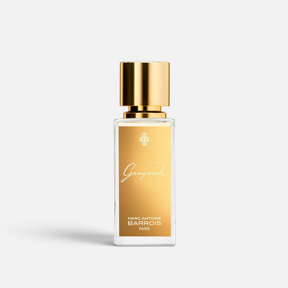Shop Rescue Spa Ganymede Eau de Parfum in a clear glass bottle with a metallic gold label and matching gold cap.