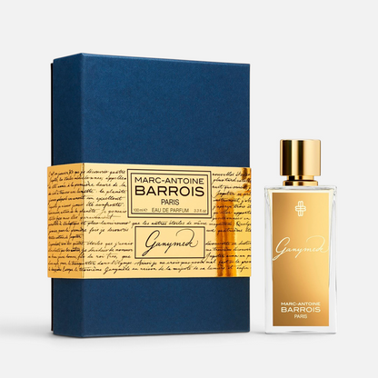 Shop Rescue Spa Marc-Antoine Barrois Ganymede Eau de Parfum in a blue box with gold label and metallic gold bottle.