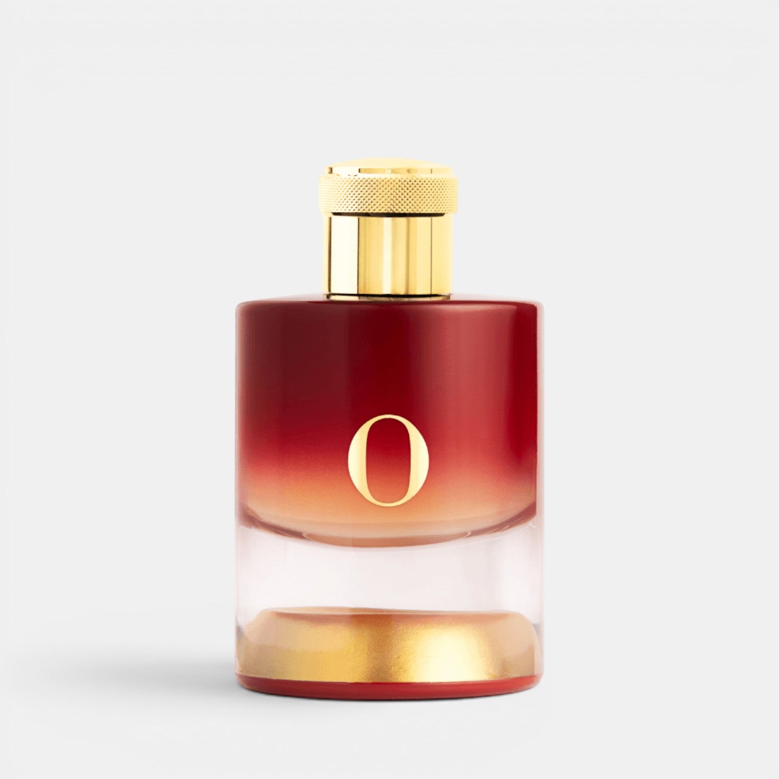 A modern cylindrical perfume bottle with a red-to-clear gradient body, a textured gold cap, and a large gold letter 'O' on the front, set against a clean light gray background.