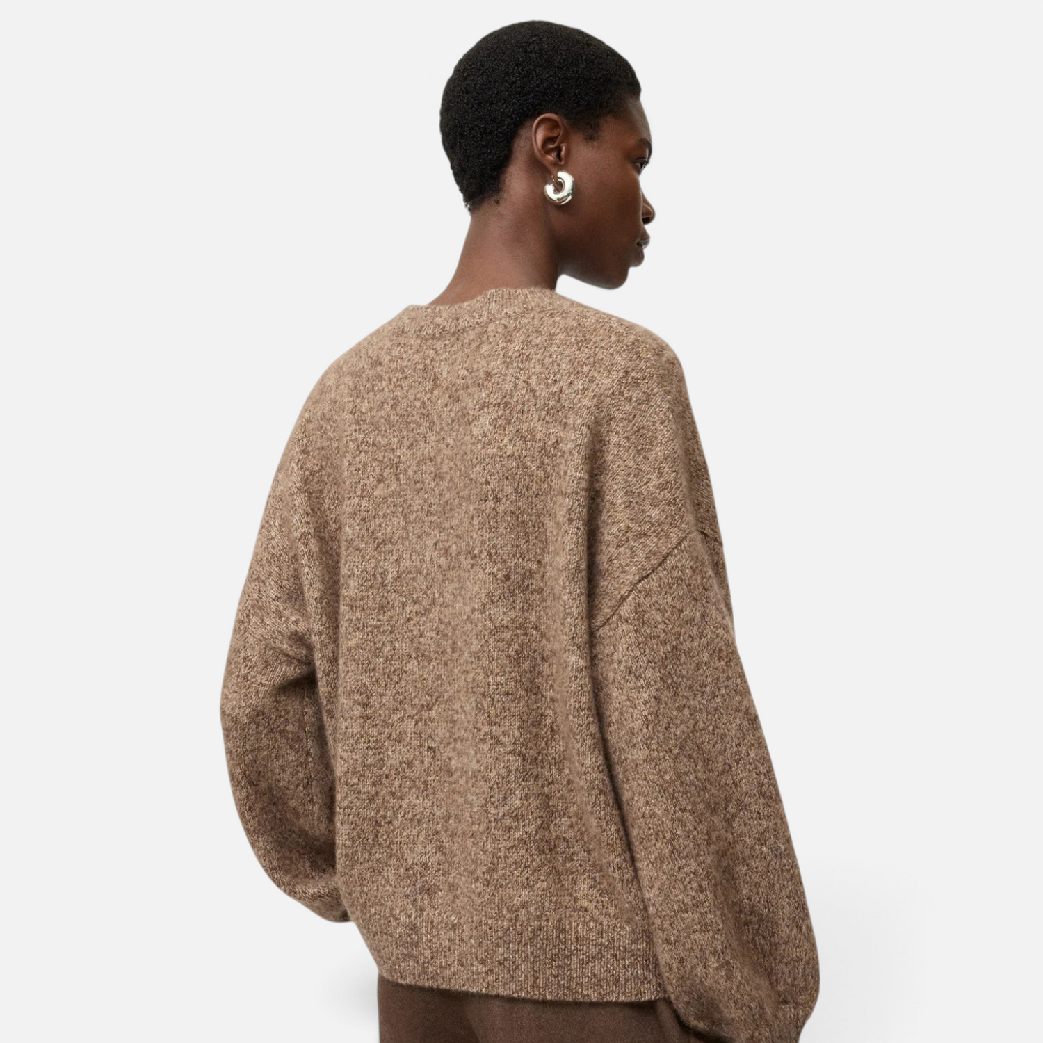 Shop Rescue Spa marled brown cashmere and silk crewneck sweater with a relaxed fit worn by a model from behind.
