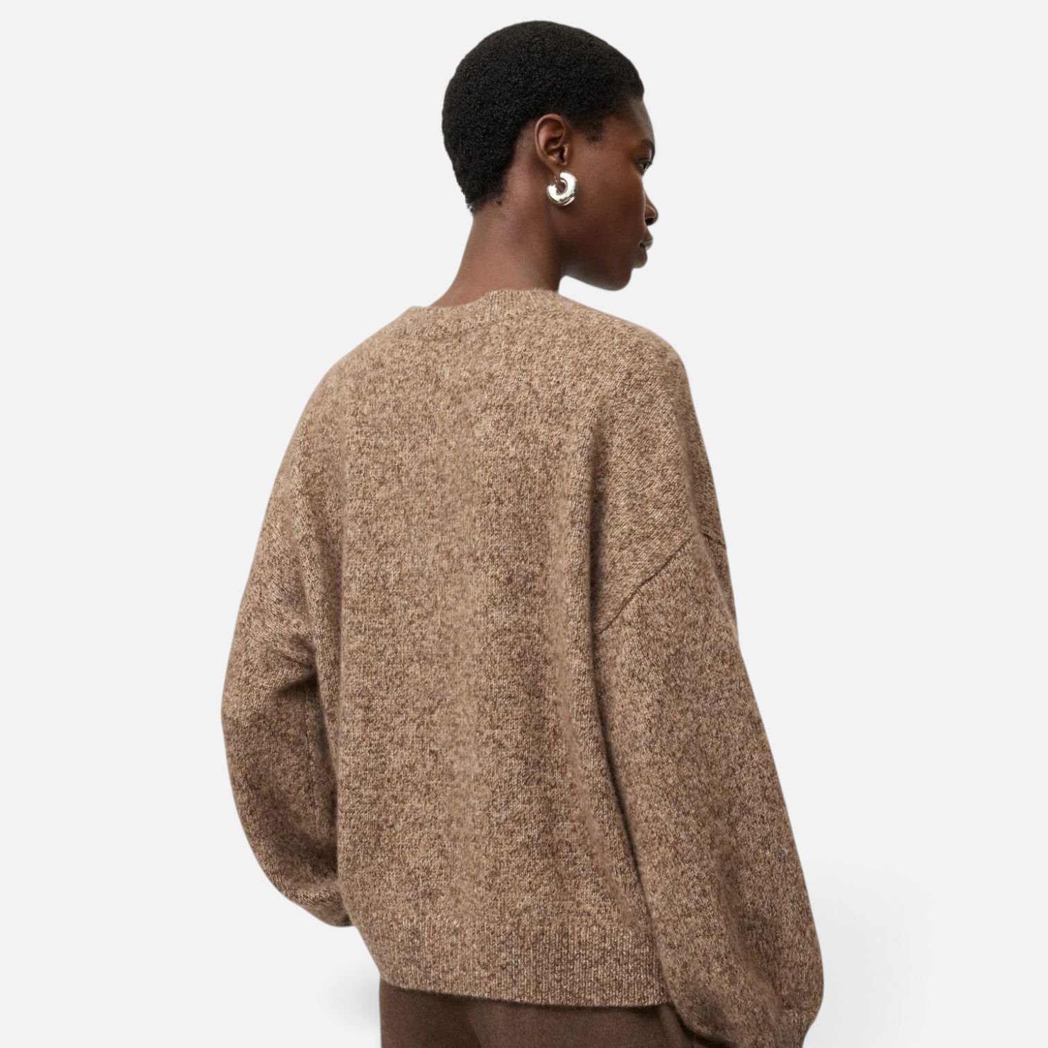 Shop Rescue Spa marled brown cashmere and silk crewneck sweater with a relaxed fit worn by a model from behind.