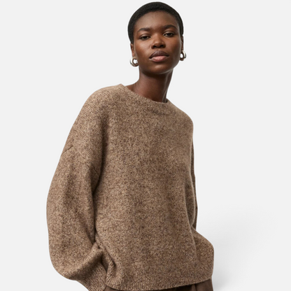 Shop Rescue Spa marled brown cashmere and silk blend crewneck sweater with a relaxed fit worn by a model