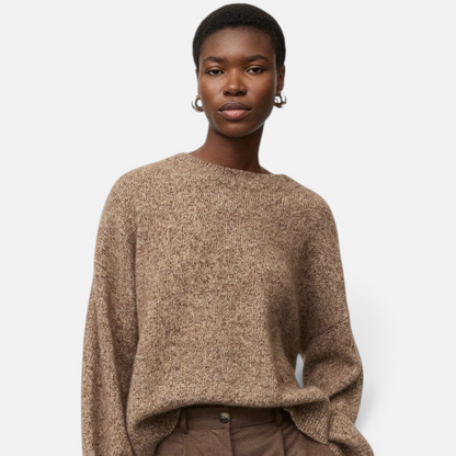 Shop Rescue Spa marled brown cashmere and silk crewneck sweater worn by a model with wide-leg trousers