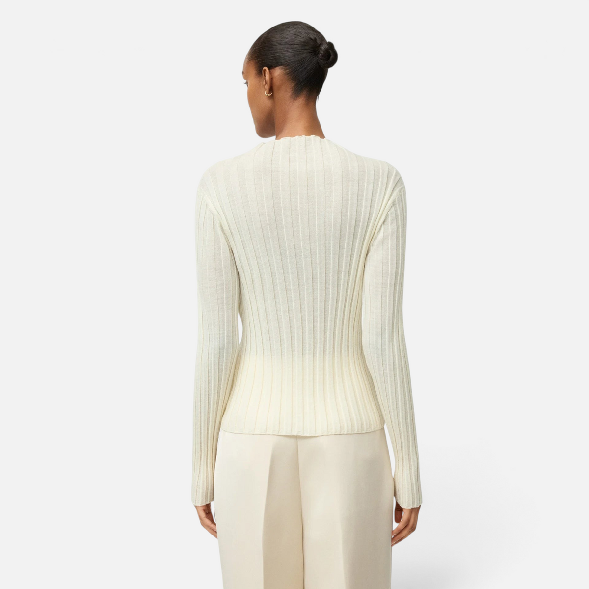 Shop Rescue Spa cream ribbed featherlight wool long-sleeve top worn by a model, back view.