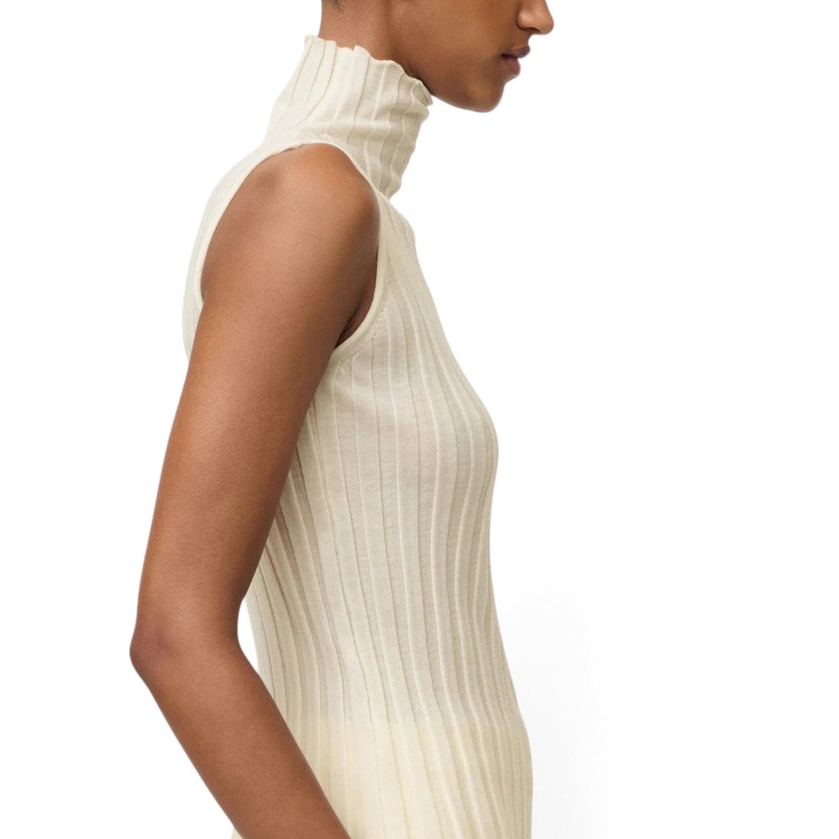 Shop Rescue Spa cream ribbed wool turtleneck singlet worn by a model in a side profile view