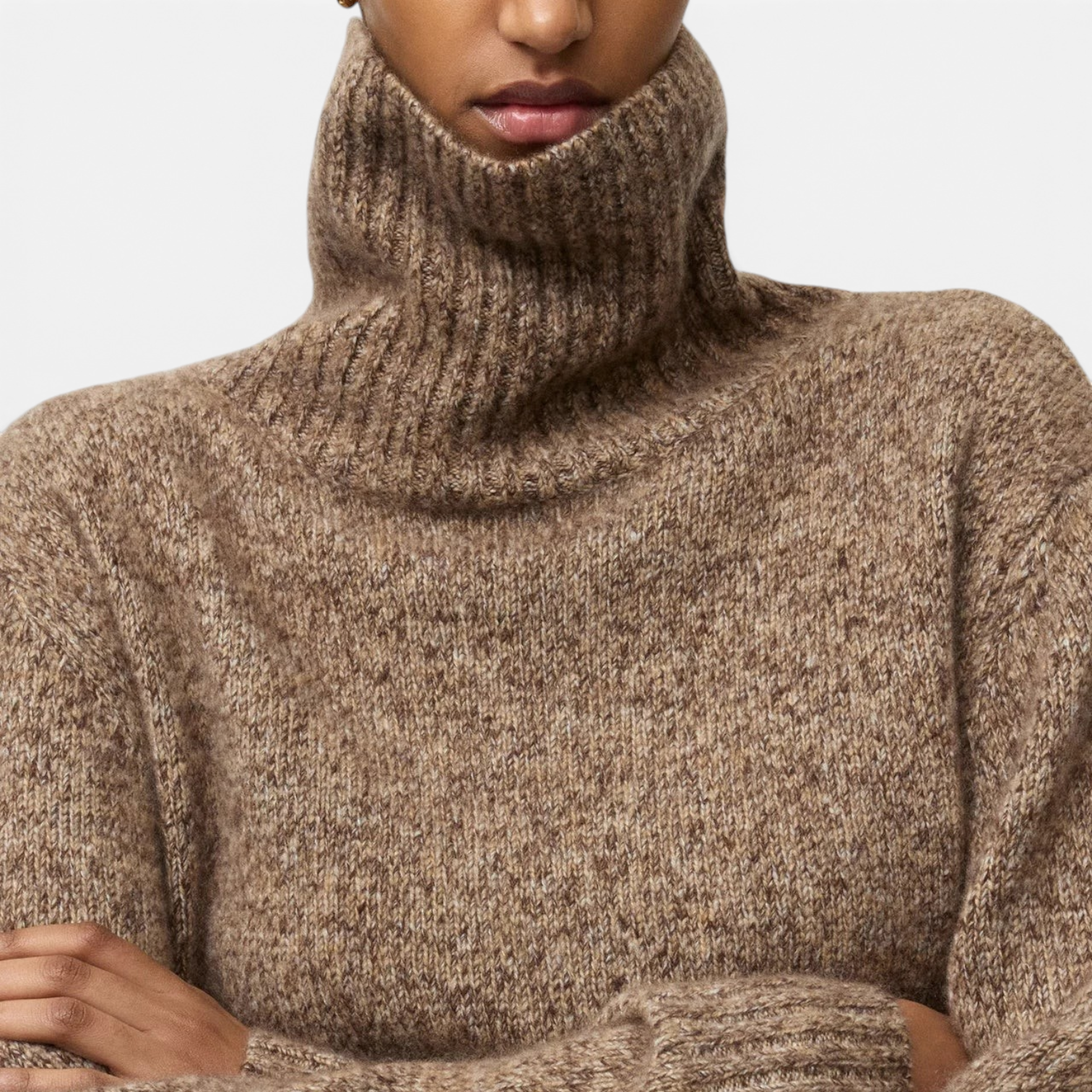 Shop Rescue Spa marled brown cashmere and silk turtleneck sweater with a relaxed fit on a model