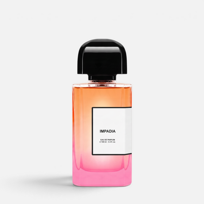 Shop Rescue Spa Impadia Eau de Parfum in a rectangular glass bottle with an orange to pink gradient and black cap.