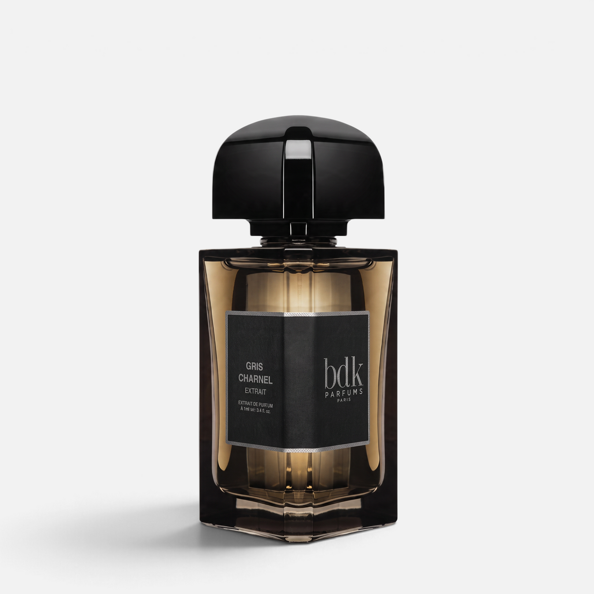 Shop Rescue Spa Gris Charnel Extrait perfume bottle in a dark amber glass with a sleek black cap and label.