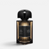 Shop Rescue Spa Gris Charnel Extrait perfume bottle in a dark amber glass with a sleek black cap and label.