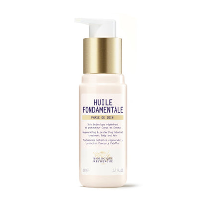 A 1.7 fl. oz. bottle of Biologique Recherche Huile Fondamentale filled with golden botanical oil, featuring a white label and gold cap, displayed on a clean white background.