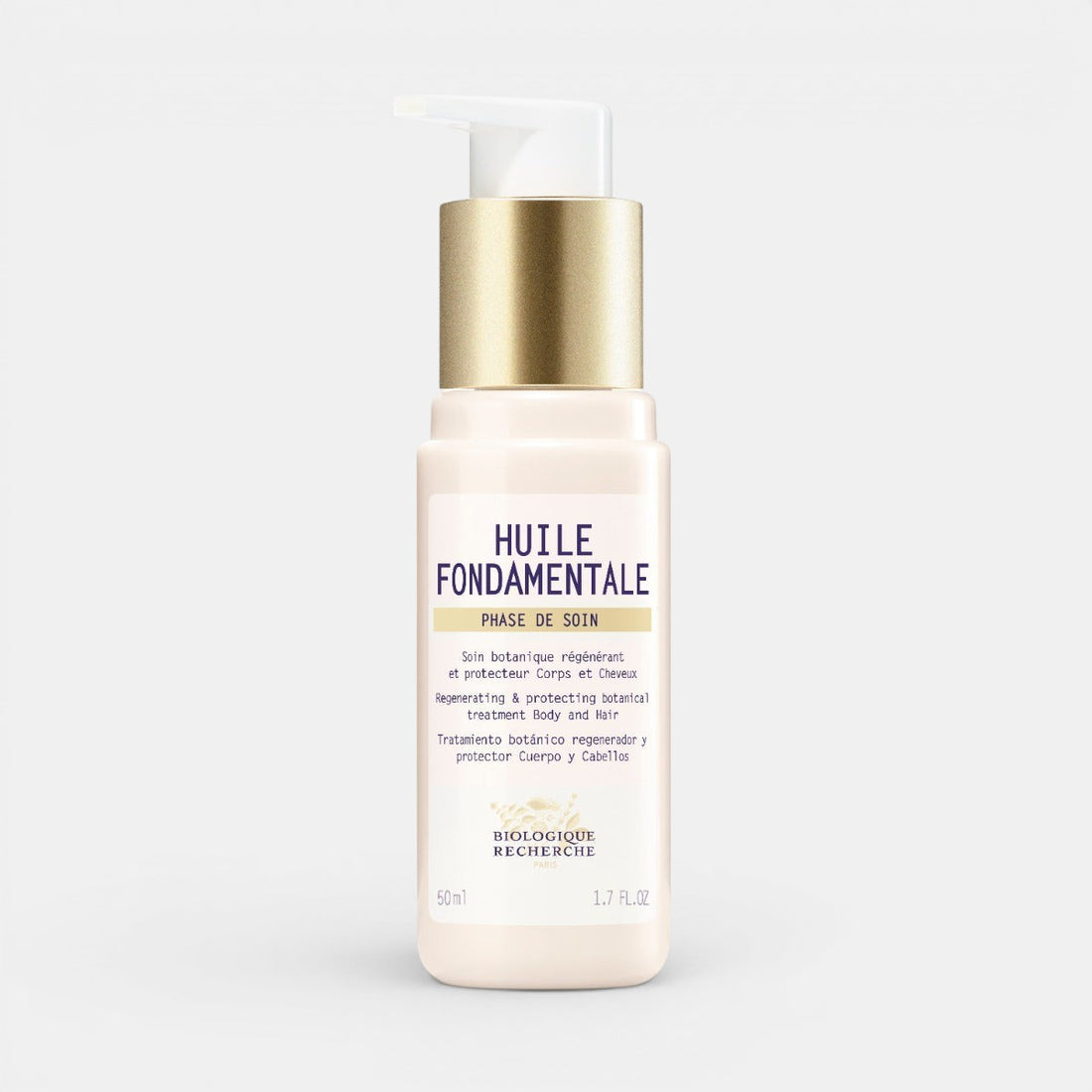 A 1.7 fl. oz. bottle of Biologique Recherche Huile Fondamentale filled with golden botanical oil, featuring a white label and gold cap, displayed on a clean white background.