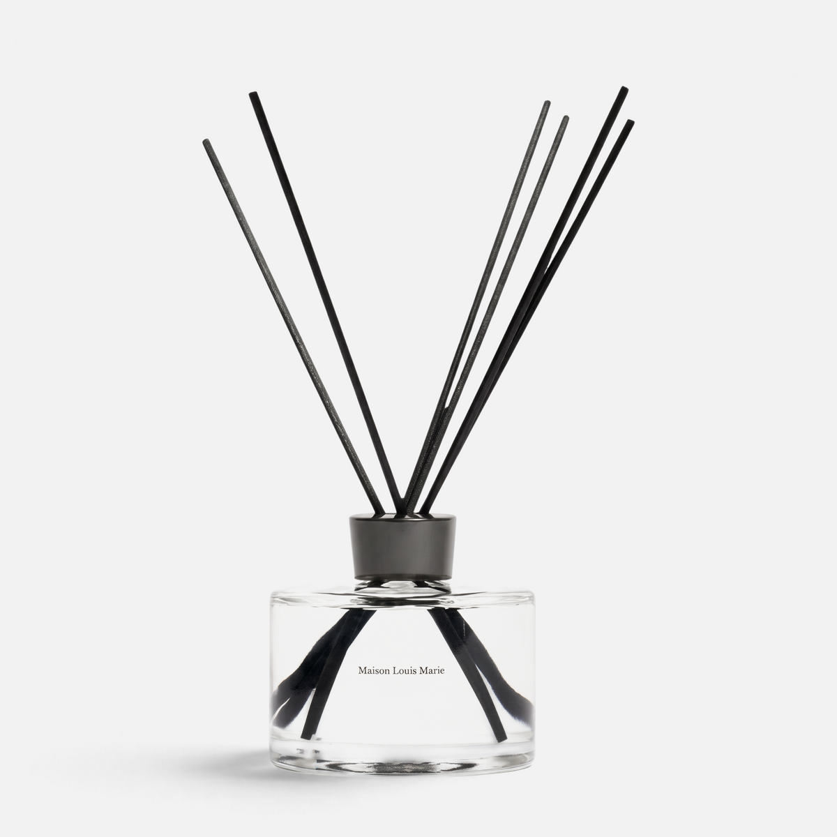 Shop Rescue Spa Maison Louis Marie No.13 Nouvelle Vague home diffuser in a clear glass bottle with black reeds