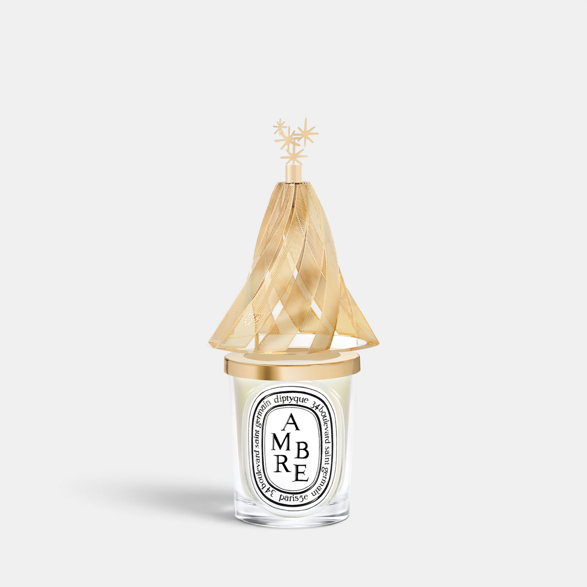 Shop Rescue Spa Diptyque holiday lantern featuring a gold pine tree silhouette with star accents for a 190g candle