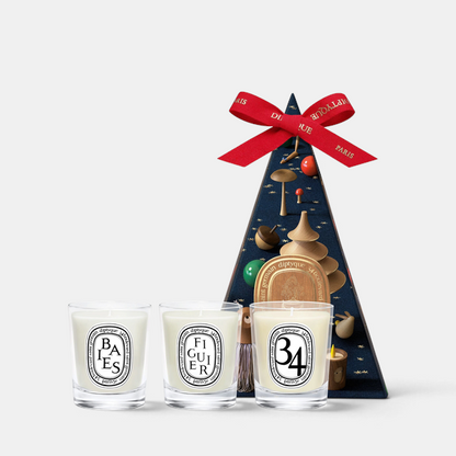 Shop Rescue Spa Diptyque holiday mini candle set featuring Baies, Figuier, and 34 Boulevard Saint Germain scents.