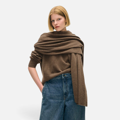 Shop Rescue Spa brown cashmere travel wrap worn as a scarf over a sweater and blue jeans