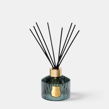 Shop Rescue Spa Trudon Figuerie home diffuser in a fluted green glass vessel with black reeds and gold emblem.