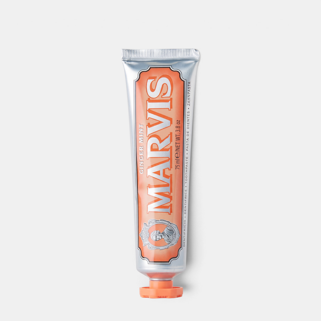 Shop Rescue Spa Marvis Ginger Mint toothpaste in a 75ml silver tube with orange accents for a fresh smile