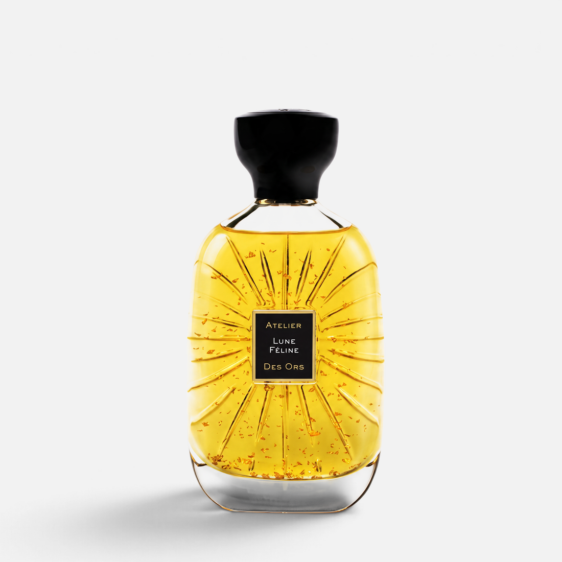 Shop Rescue Spa Atelier Des Ors Lune Feline perfume bottle with gold flakes in a glass flacon and black cap