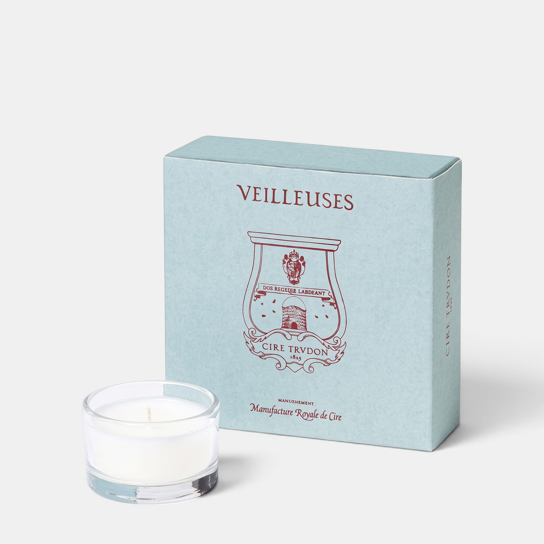 Shop Rescue Spa Cire Trudon night-light candle in a glass holder next to a light blue box of four refills