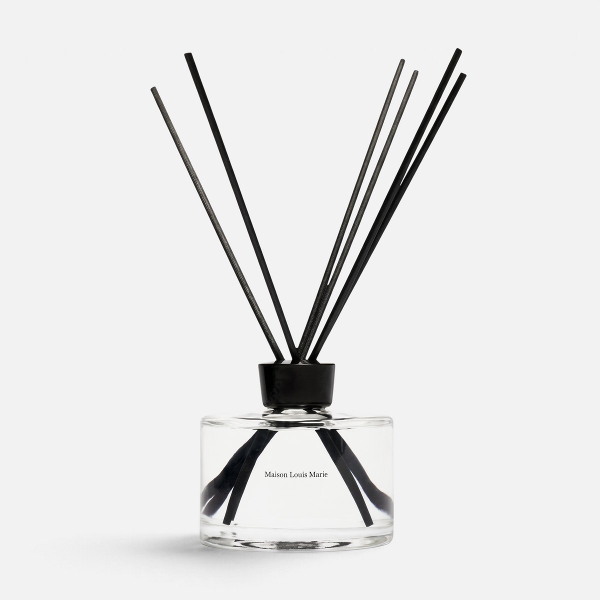 Shop Rescue Spa No.04 Bois de Balincourt home diffuser in a clear glass bottle with black reeds