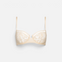 Shop Rescue Spa Pampille beige balconette bra featuring intricate Leavers lace and delicate stretch jacquard details.