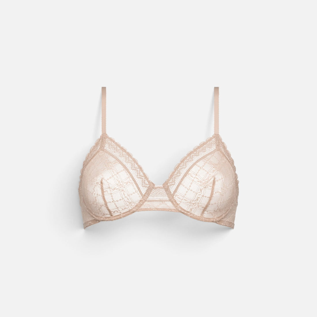 A light beige lace underwire bra with thin shoulder straps, displayed against a clean, light gray background.