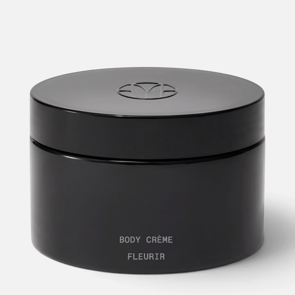 Shop Rescue Spa Mienne Body Creme in Fleurir, a rich, nourishing moisturizer in a sleek black 200ml jar.