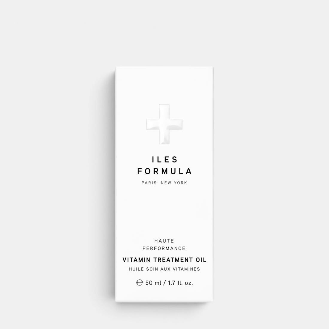 Shop Rescue Spa Iles Formula Vitamin Treatment Oil in a white 50ml bottle with minimalist black typography