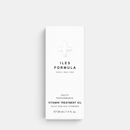 Shop Rescue Spa Iles Formula Vitamin Treatment Oil in a white 50ml bottle with minimalist black typography