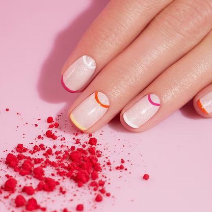 Shop Rescue Spa Manucurist Green Flash gel manicure featuring a sheer base with colorful French and moon tip accents.
