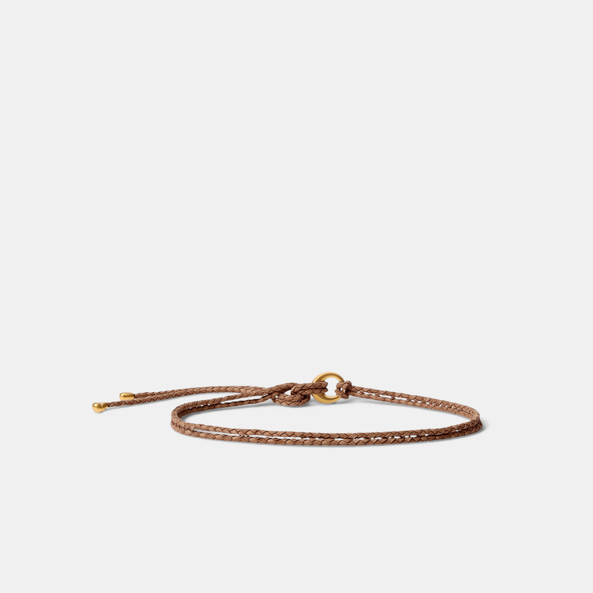 Shop Rescue Spa Salta belt in canyon brown braided suede and neoprene with a gold-tone ring buckle