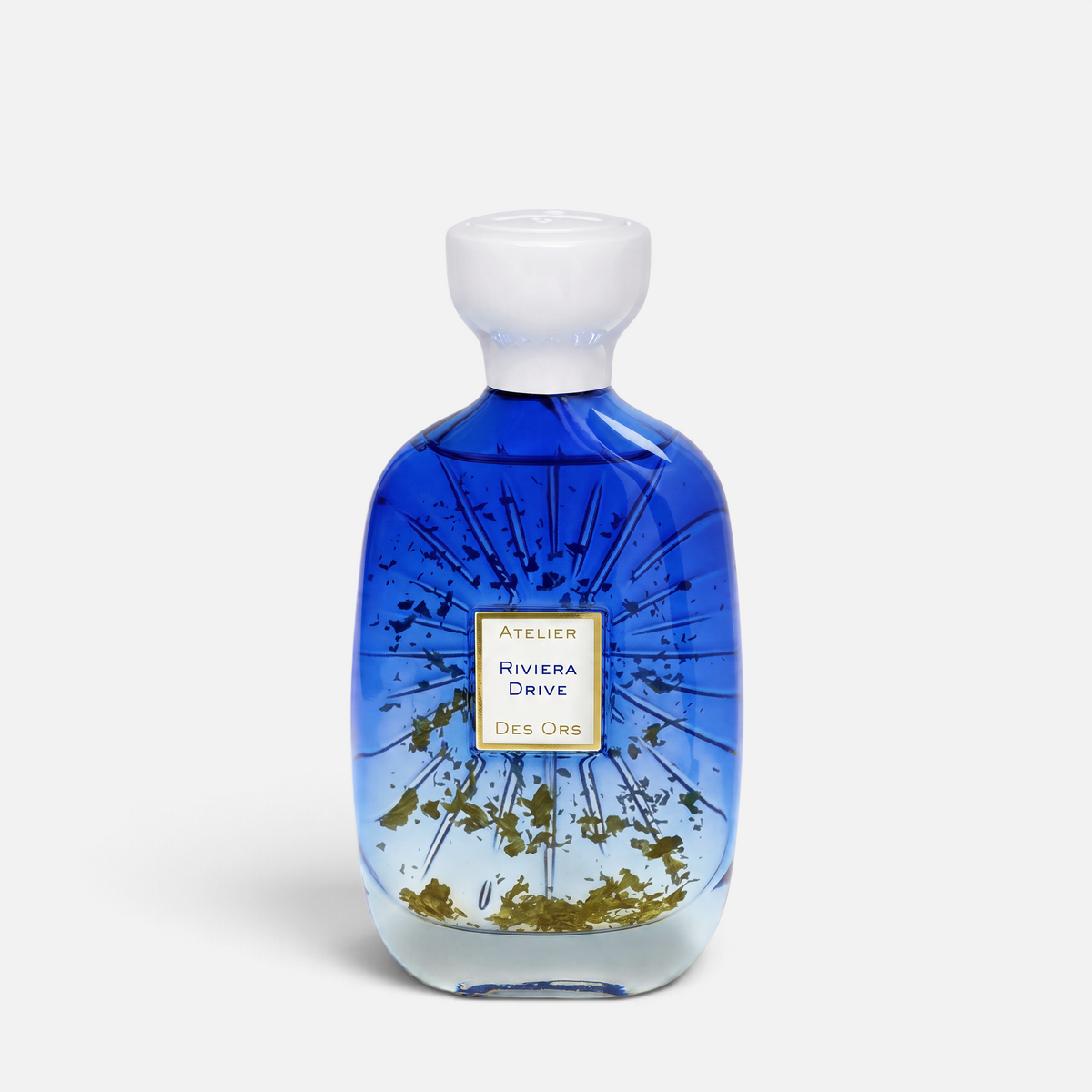 Shop Rescue Spa Riviera Drive fragrance in a blue gradient glass bottle with gold flakes and a white cap