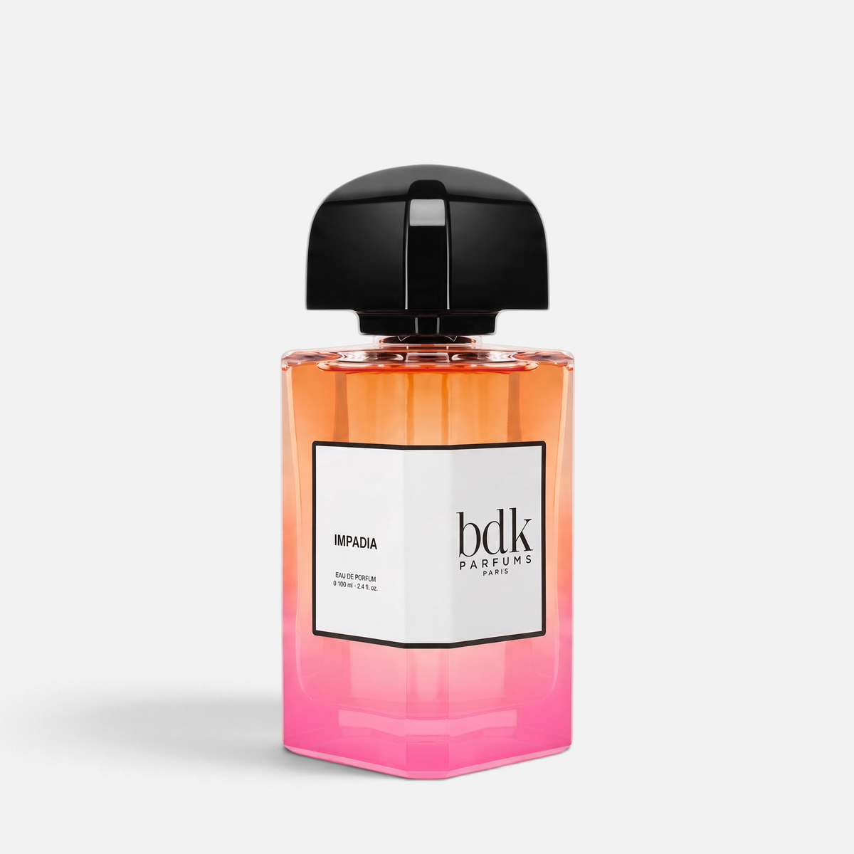 Shop Rescue Spa Impadia Eau de Parfum in a 100ml glass bottle with a gradient orange to pink design and black cap.