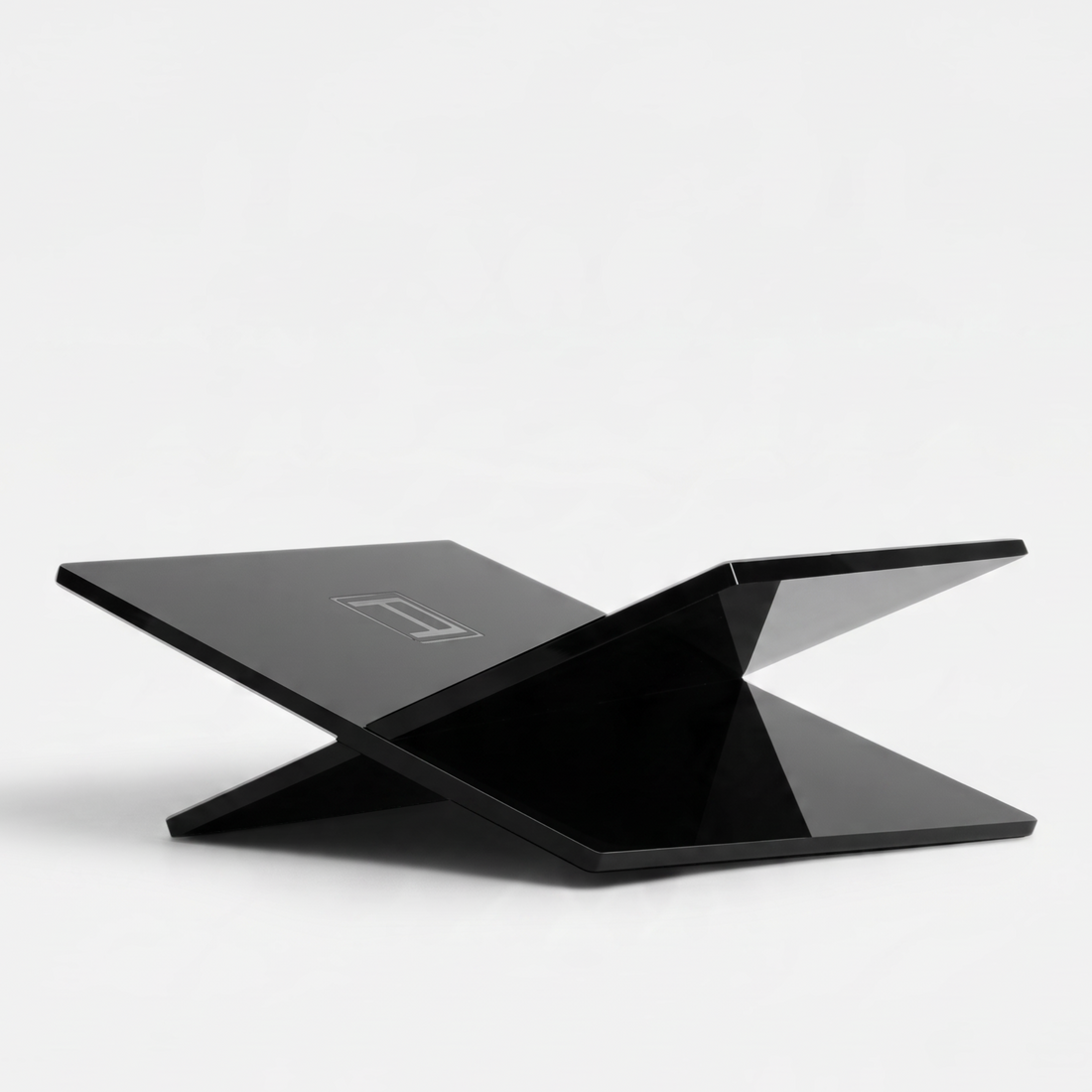 Shop Rescue Spa black Assouline bookstand with engraved A logo, elegant minimalist design for displaying large books.