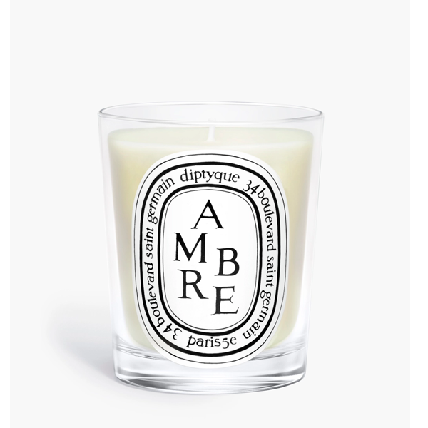 Diptyque Ambre candle on a white background