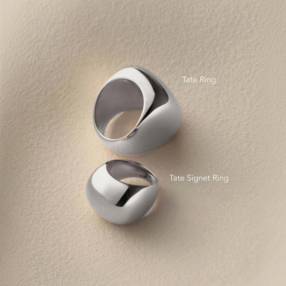 Shop Rescue Spa Tate Ring and Tate Signet Ring in high-polish platinum-plated steel with a rounded sculptural form.