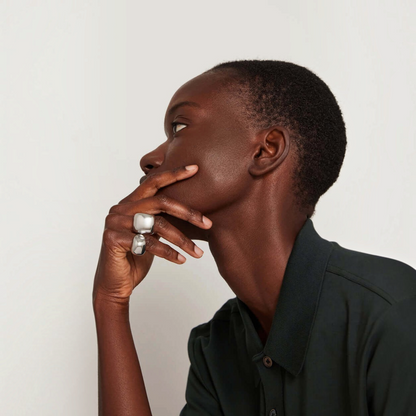 Shop Rescue Spa Tate Signet Ring in high-polish platinum-plated steel worn on a model&