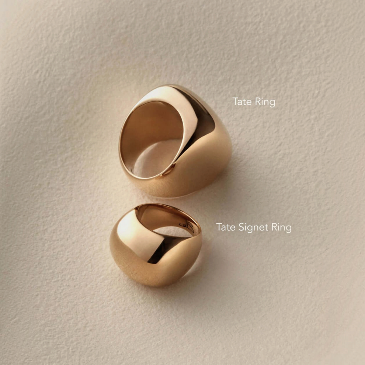 Shop Rescue Spa Tate Ring and Tate Signet Ring in high-polish gold, featuring bold, rounded sculptural silhouettes.